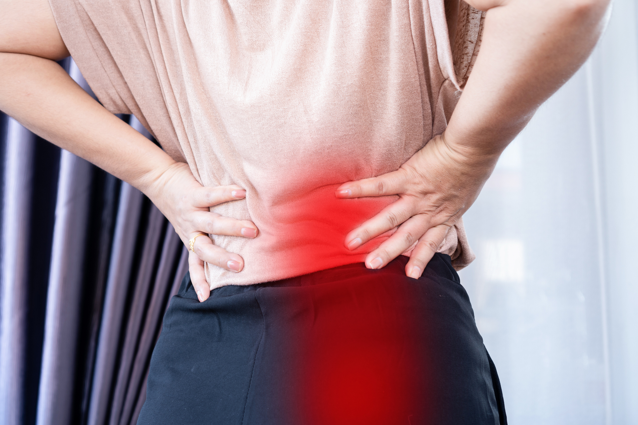 Person with sciatica nerve pain requiring specialized treatment in Costa Mesa chiropractic clinic