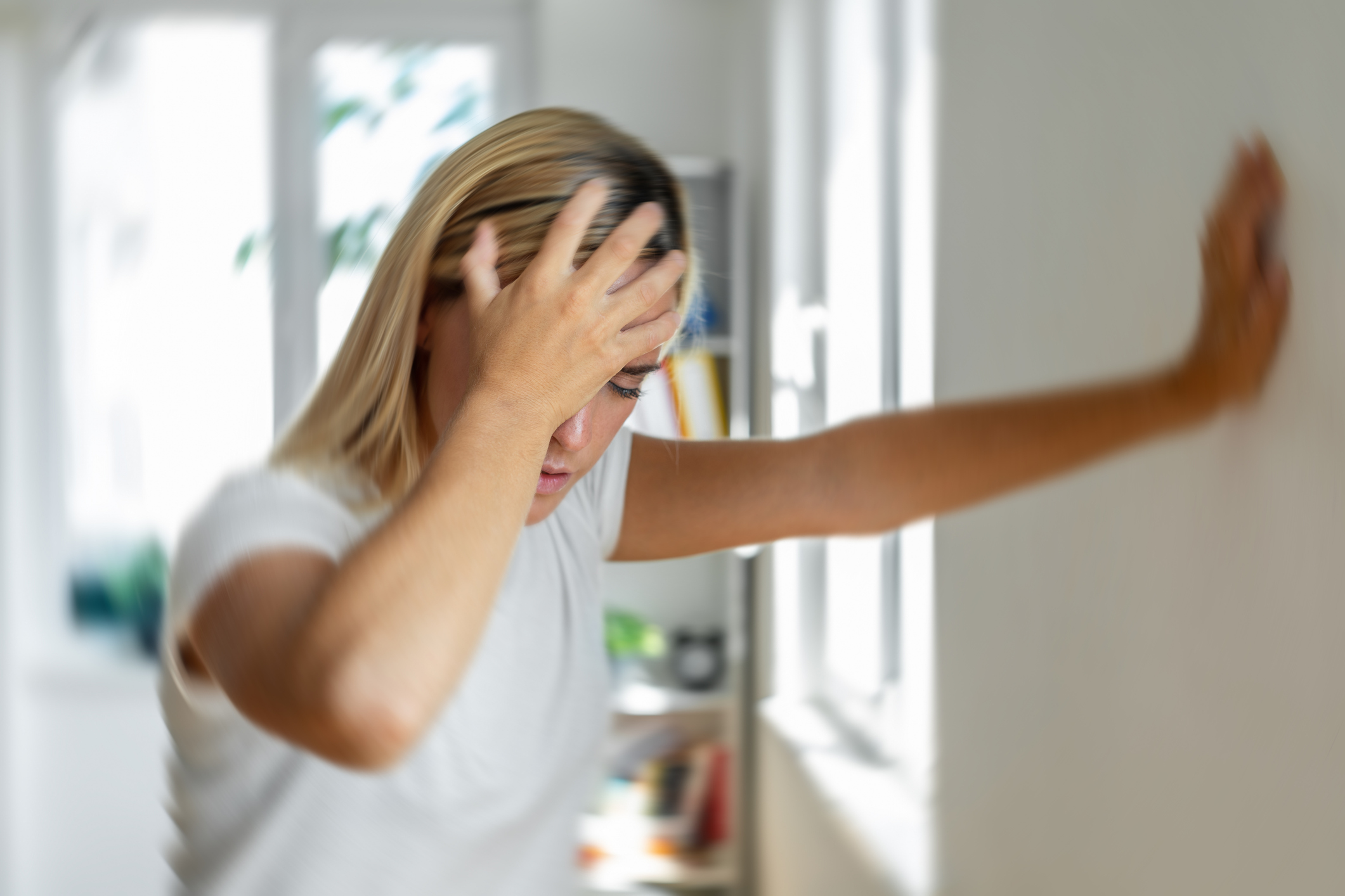 Person experiencing vertigo dizziness requiring specialized treatment in Costa Mesa