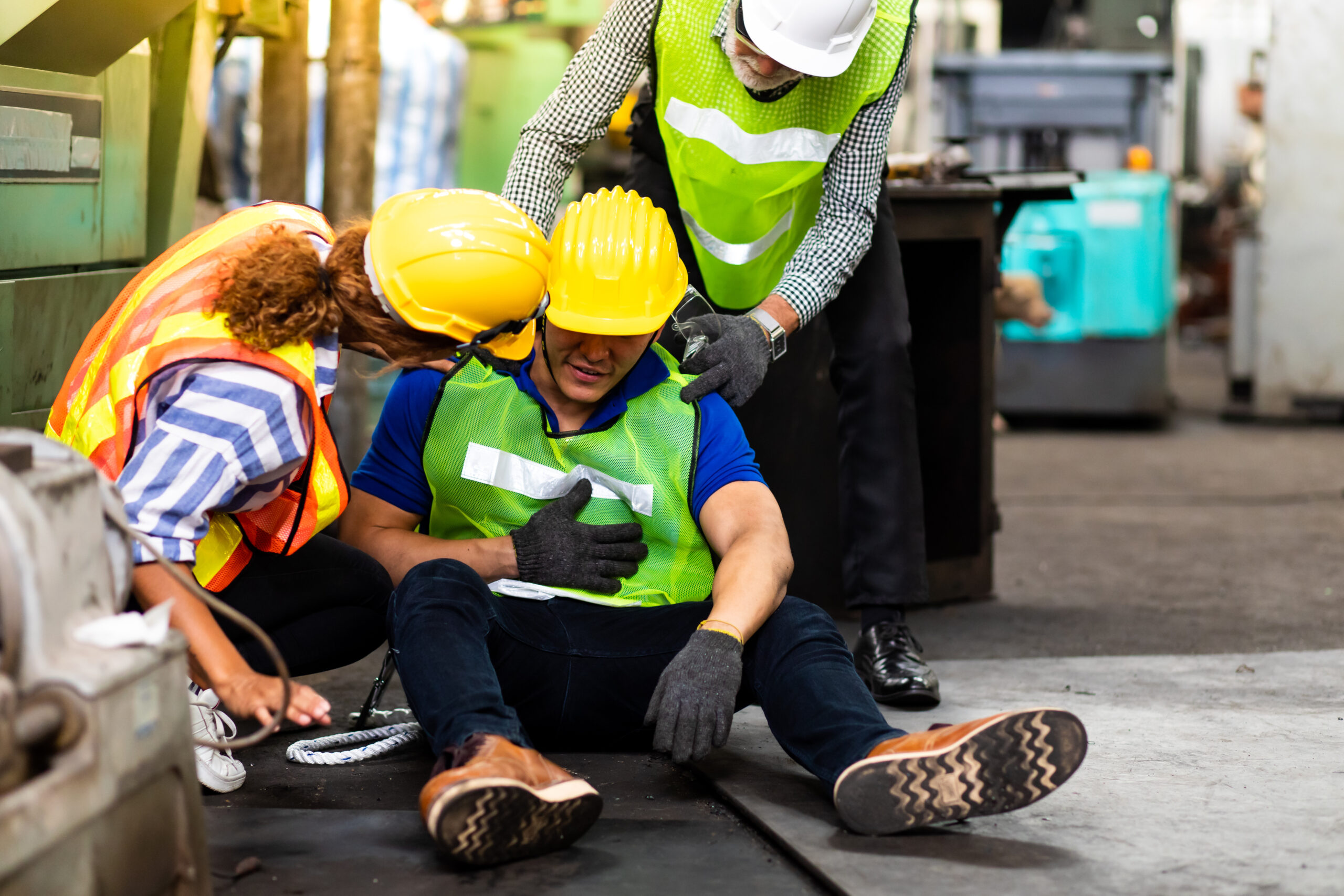 Worker experiencing workplace injury requiring treatment at Costa Mesa chiropractic clinic